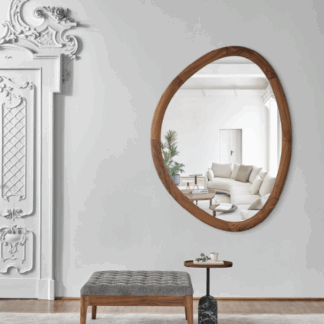 Ronde designspiegel Giolo van Porada met houten frame en organische vormen